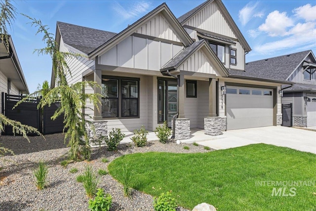 7779 W Daybreak Run Ct, Meridian, ID 83646 - view of front of property with board and batten siding, concrete driveway, a shingled roof, stone siding, and a garage