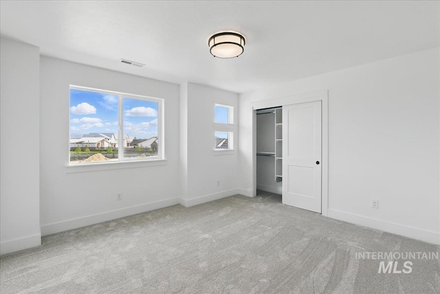 7779 W Daybreak Run Ct, Meridian, ID 83646 - unfurnished bedroom with carpet flooring, baseboards, and a closet