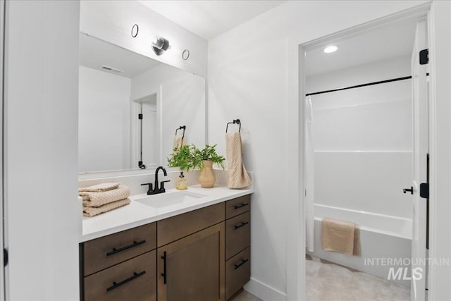 7779 W Daybreak Run Ct, Meridian, ID 83646 - full bathroom with vanity, bathtub / shower combination, and recessed lighting