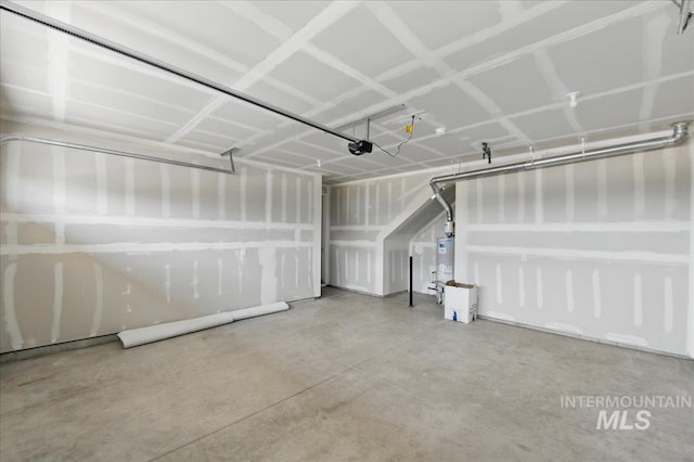 7779 W Daybreak Run Ct, Meridian, ID 83646 - garage with gas water heater and a garage door opener