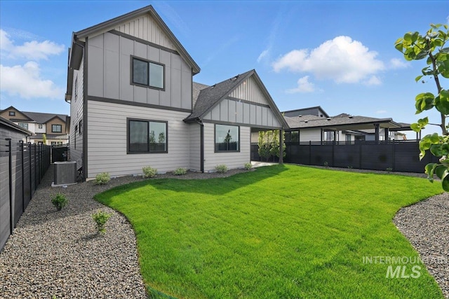 7779 W Daybreak Run Ct, Meridian, ID 83646 - back of property with board and batten siding and central AC unit