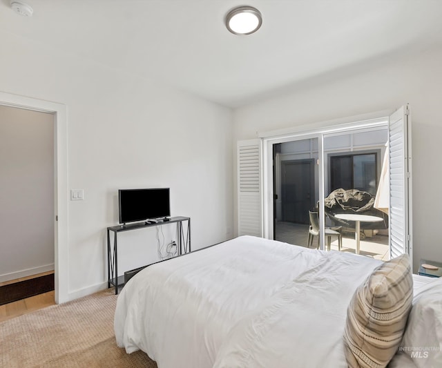 1681 W Idaho St, Boise, ID 83702 - bedroom featuring baseboards and access to outside