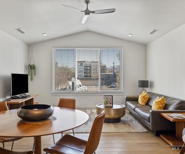 1681 W Idaho St, Boise, ID 83702 - living area featuring wood finished floors, visible vents, lofted ceiling, and ceiling fan