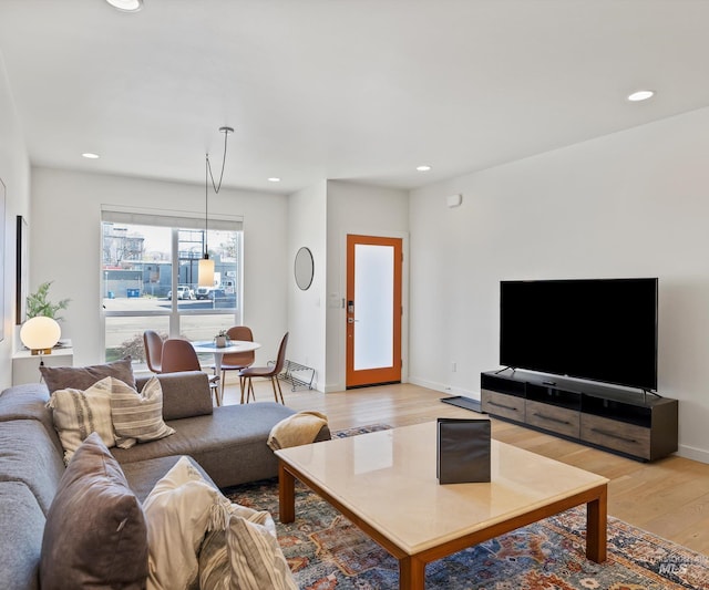 1681 W Idaho St, Boise, ID 83702 - living area featuring baseboards, recessed lighting, and light wood-style floors