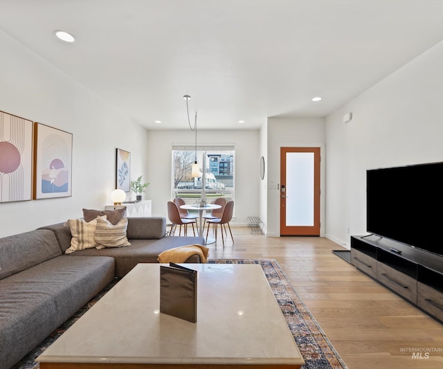 1681 W Idaho St, Boise, ID 83702 - living room featuring recessed lighting, light wood-style floors, and baseboards