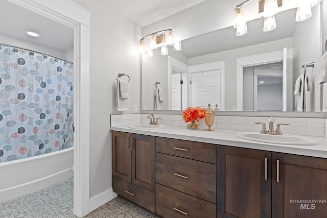 486 E Andes Dr, Kuna, ID 83634 - full bath featuring a sink, shower / tub combo, baseboards, and double vanity