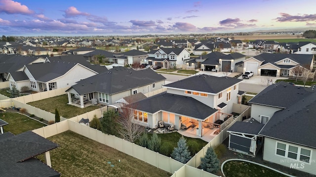 486 E Andes Dr, Kuna, ID 83634 - aerial view at dusk with a residential view