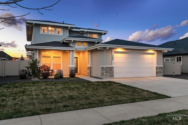 486 E Andes Dr, Kuna, ID 83634 - view of front facade with a porch, fence, a garage, and driveway