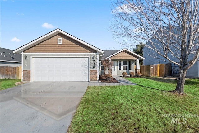 single story home featuring a garage and a front lawn