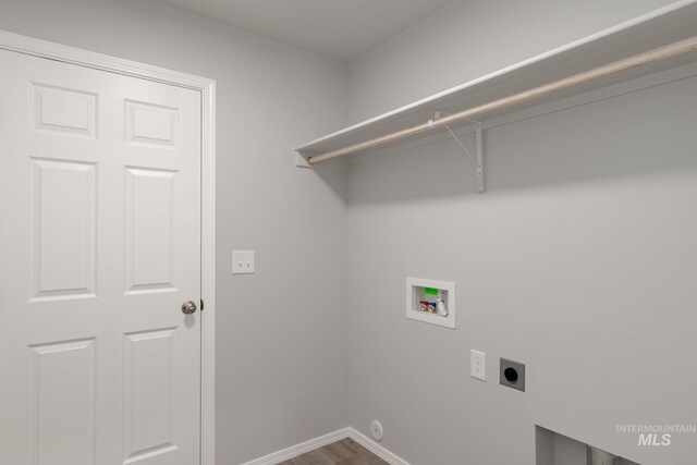 310 Chalcedony Ave, Caldwell, ID 83605 - laundry room featuring hookup for an electric dryer, washer hookup, baseboards, laundry area, and wood finished floors