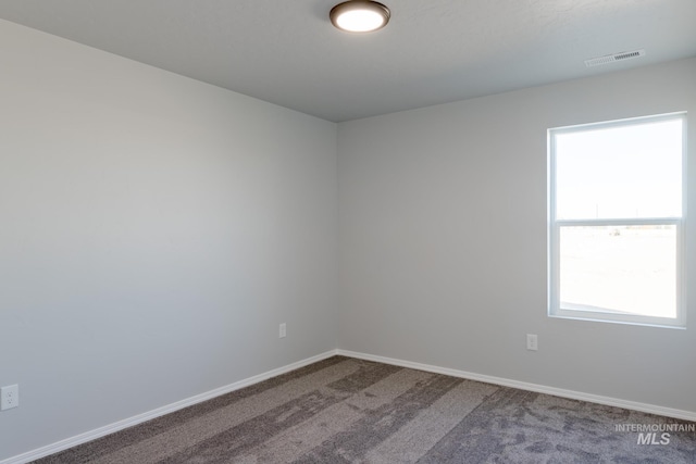 310 Chalcedony Ave, Caldwell, ID 83605 - empty room featuring baseboards, visible vents, and carpet