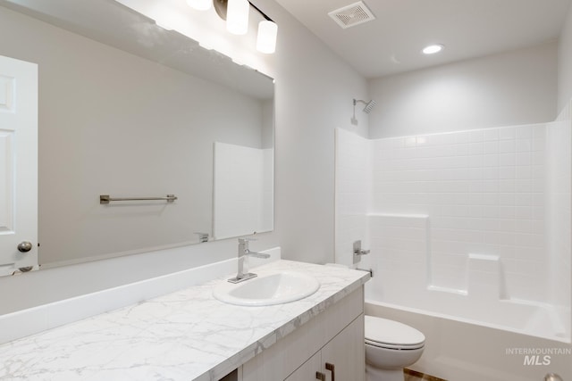 310 Chalcedony Ave, Caldwell, ID 83605 - full bathroom featuring visible vents, toilet, recessed lighting, vanity, and shower / tub combination