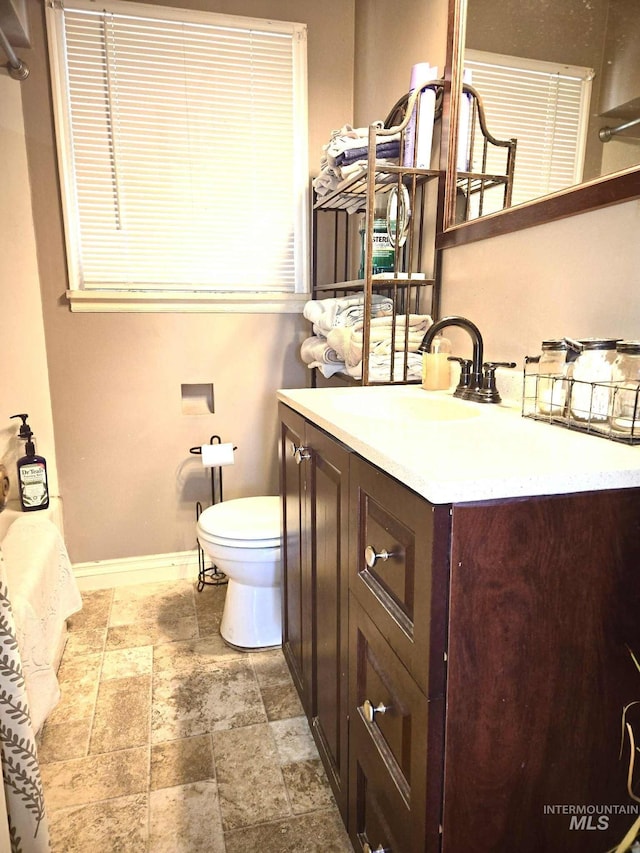 1025 9th St, Clarkston, WA 99403 - bathroom featuring vanity and stone finish floors