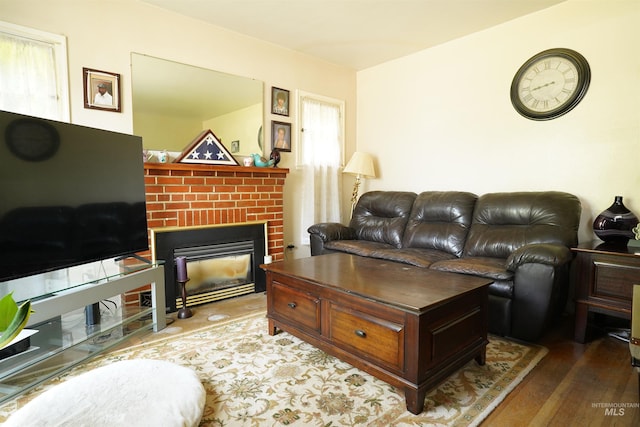 1025 9th St, Clarkston, WA 99403 - living area with hardwood / wood-style floors and a fireplace