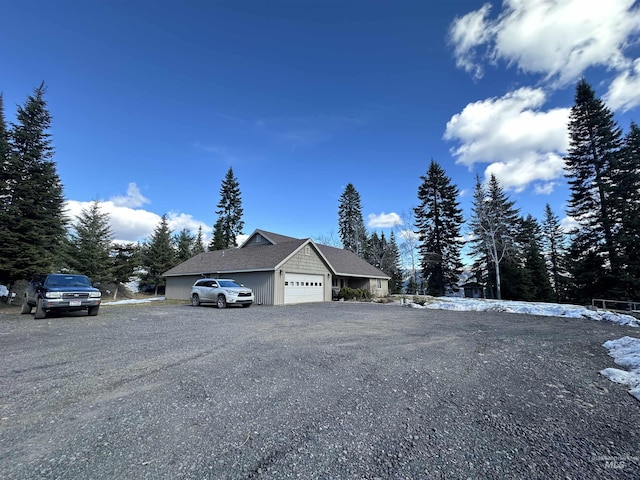 view of property exterior featuring a garage