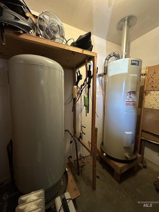 utility room featuring water heater