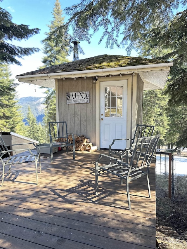 deck featuring an outbuilding