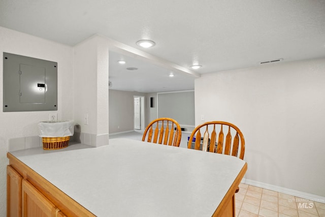 dining room featuring visible vents, recessed lighting, electric panel, and baseboards