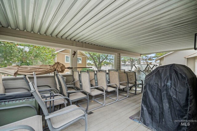 wooden terrace with grilling area