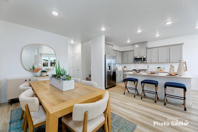 dining area featuring light hardwood / wood-style flooring