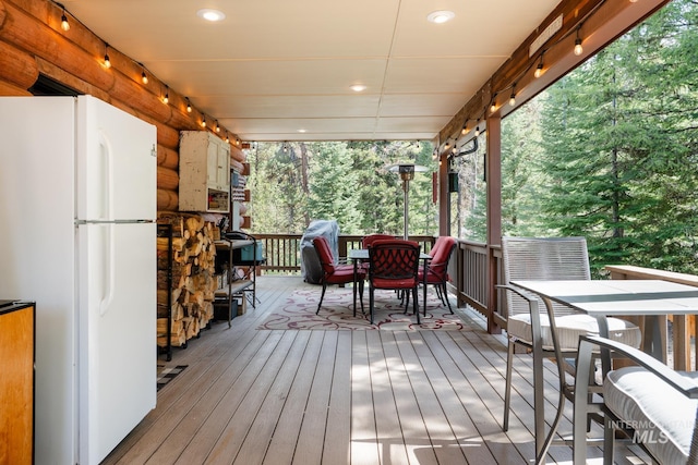 deck featuring outdoor dining space
