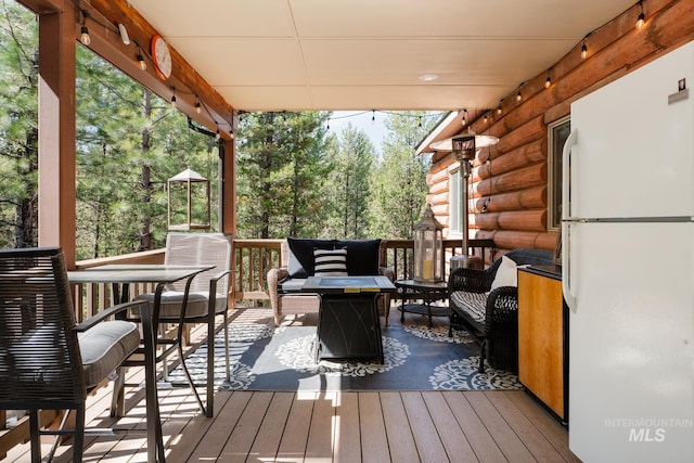deck with an outdoor living space