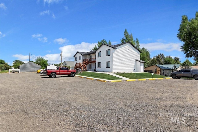 view of front of home with a front lawn