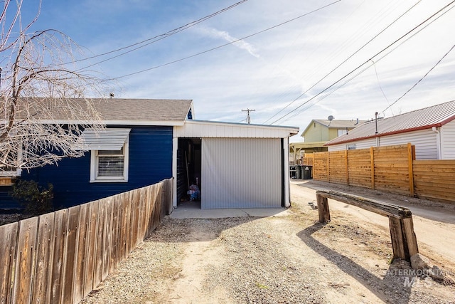 garage featuring fence