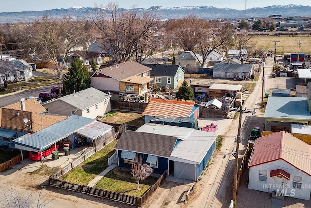 bird's eye view with a residential view and a mountain view