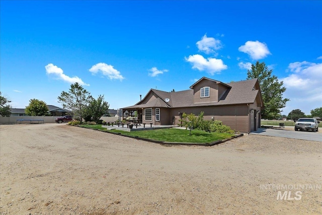 view of property featuring a patio area