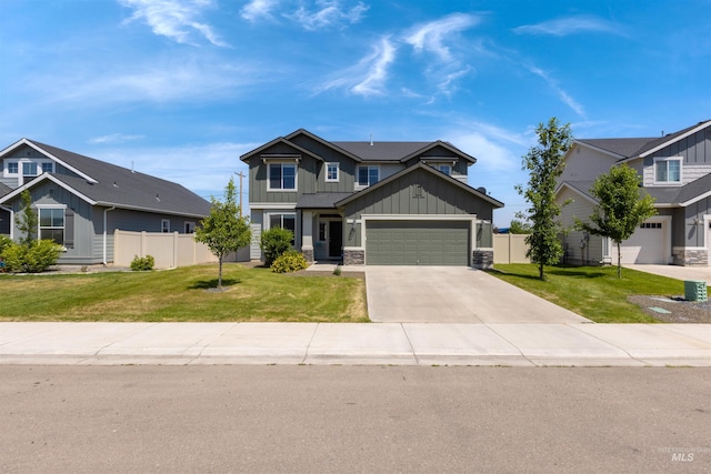 1417 Scranton Ave, Caldwell, ID 83605 - craftsman inspired home featuring board and batten siding, driveway, an attached garage, and stone siding