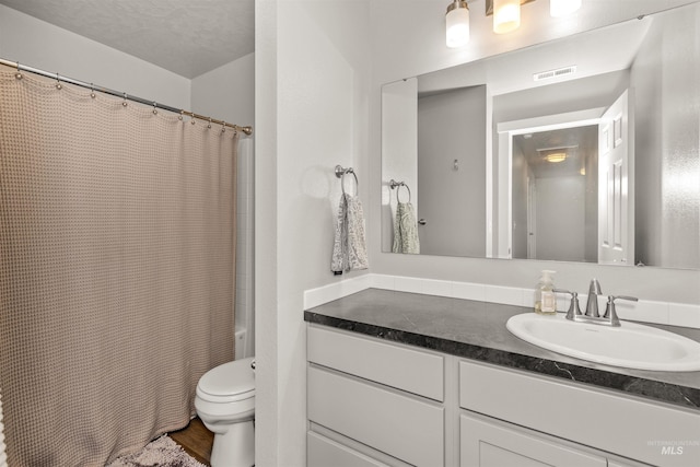 1417 Scranton Ave, Caldwell, ID 83605 - full bathroom featuring vanity and toilet