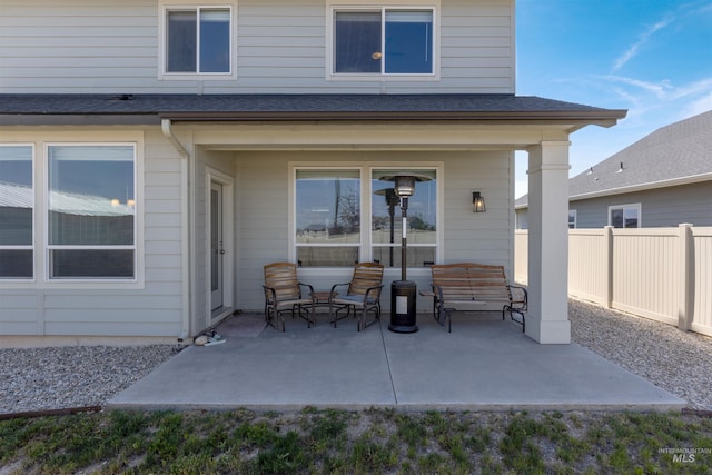 1417 Scranton Ave, Caldwell, ID 83605 - back of property featuring a patio area and roof with shingles