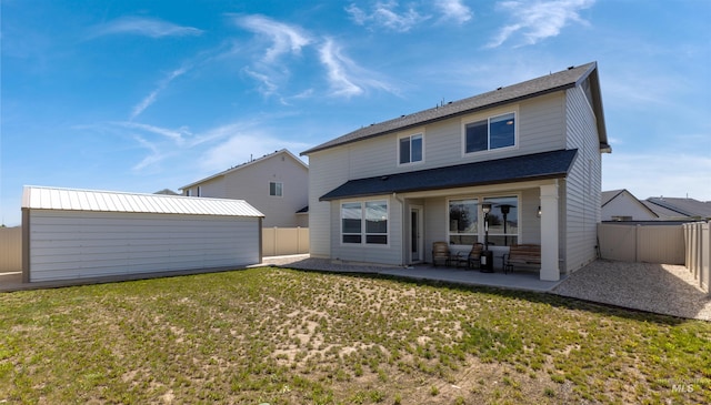 1417 Scranton Ave, Caldwell, ID 83605 - back of property with a patio, an outbuilding, and roof with shingles