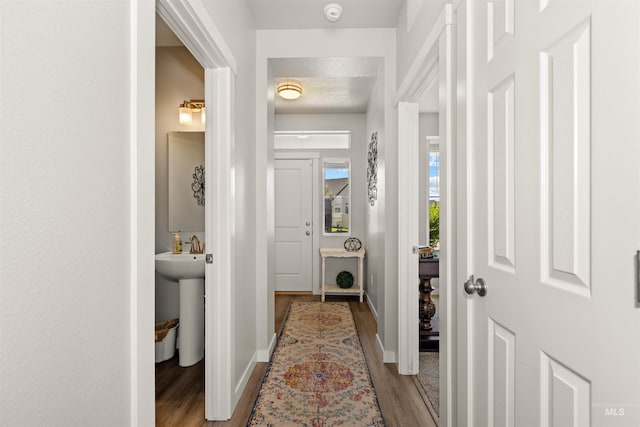 1417 Scranton Ave, Caldwell, ID 83605 - corridor with light wood finished floors and baseboards