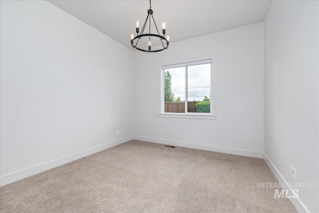 4923 W Canaston St, Meridian, ID 83646 - empty room with a chandelier, light colored carpet, and baseboards