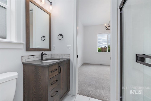 4923 W Canaston St, Meridian, ID 83646 - bathroom with vanity, toilet, and tiled shower