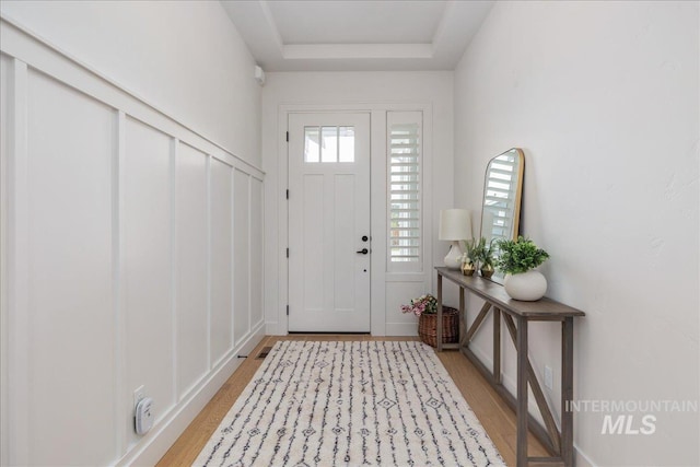 4923 W Canaston St, Meridian, ID 83646 - foyer entrance featuring light wood-style flooring and a raised ceiling