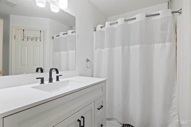 389 Trotter Dr, Twin Falls, ID 83301 - bathroom with vanity and a shower with shower curtain