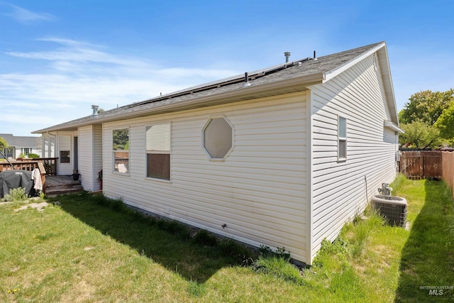 389 Trotter Dr, Twin Falls, ID 83301 - view of side of home with central air condition unit and a wooden deck
