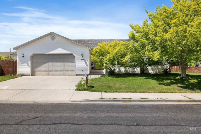 389 Trotter Dr, Twin Falls, ID 83301 - view of front facade featuring concrete driveway and a garage