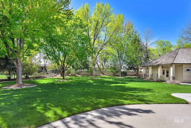 view of yard featuring fence