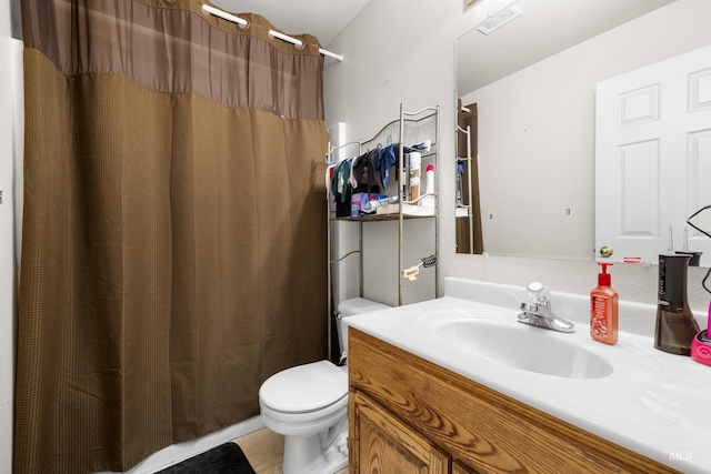 660 Teton, Mountain Home, ID 83647 - bathroom featuring vanity, toilet, a shower with shower curtain, and visible vents