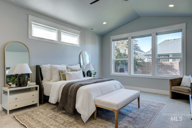 bedroom with vaulted ceiling, light carpet, recessed lighting, and baseboards
