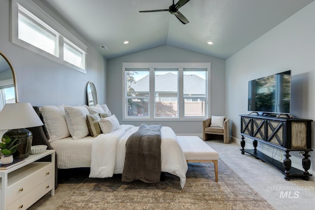 carpeted bedroom with lofted ceiling, multiple windows, a ceiling fan, and recessed lighting