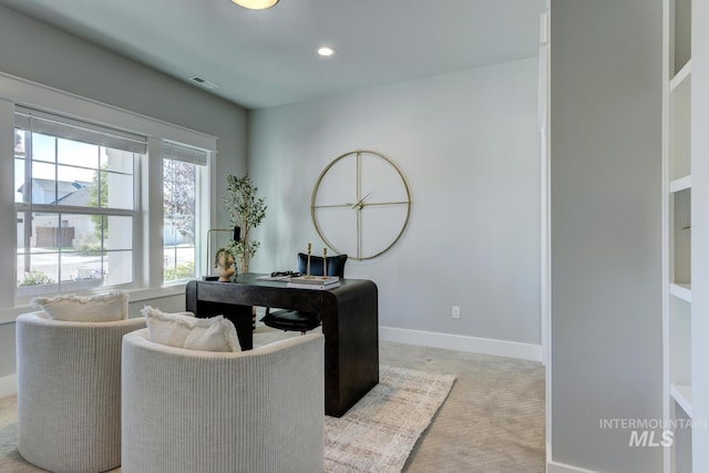 office space with light carpet, baseboards, and recessed lighting