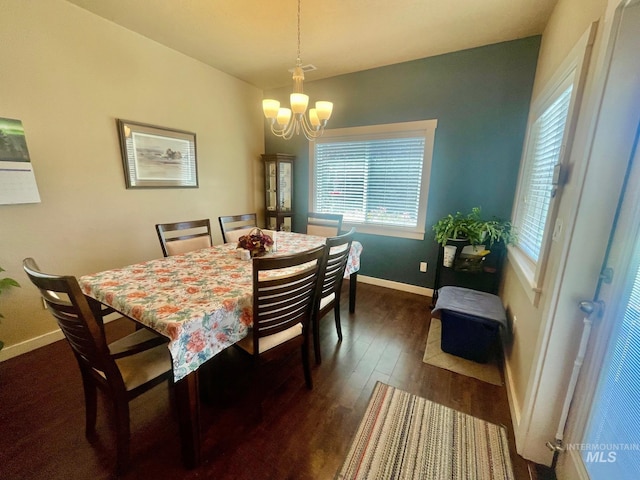 719 W Arbor Pointe, Nampa, ID 83686 - dining area featuring a chandelier and dark wood-style floors