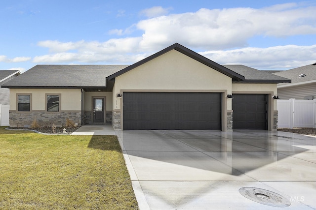 ranch-style home featuring a garage, stone siding, driveway, and stucco siding