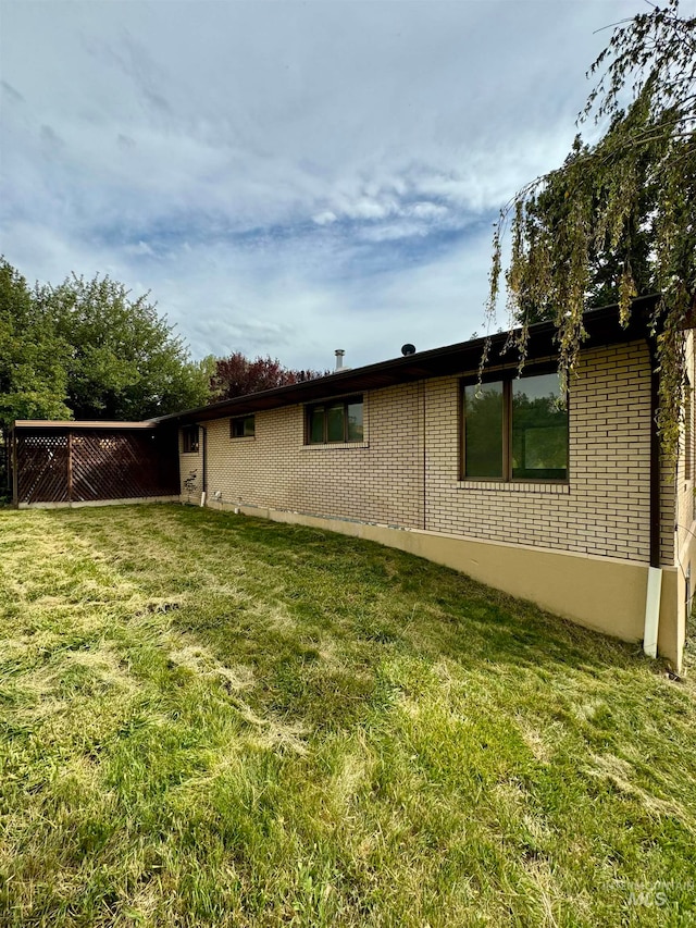 exterior space with a lawn