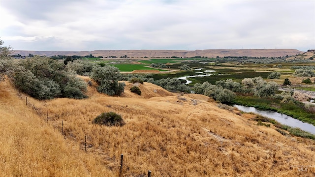 aerial view featuring a water view and a rural view